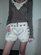 Heart-embroidered court shorts